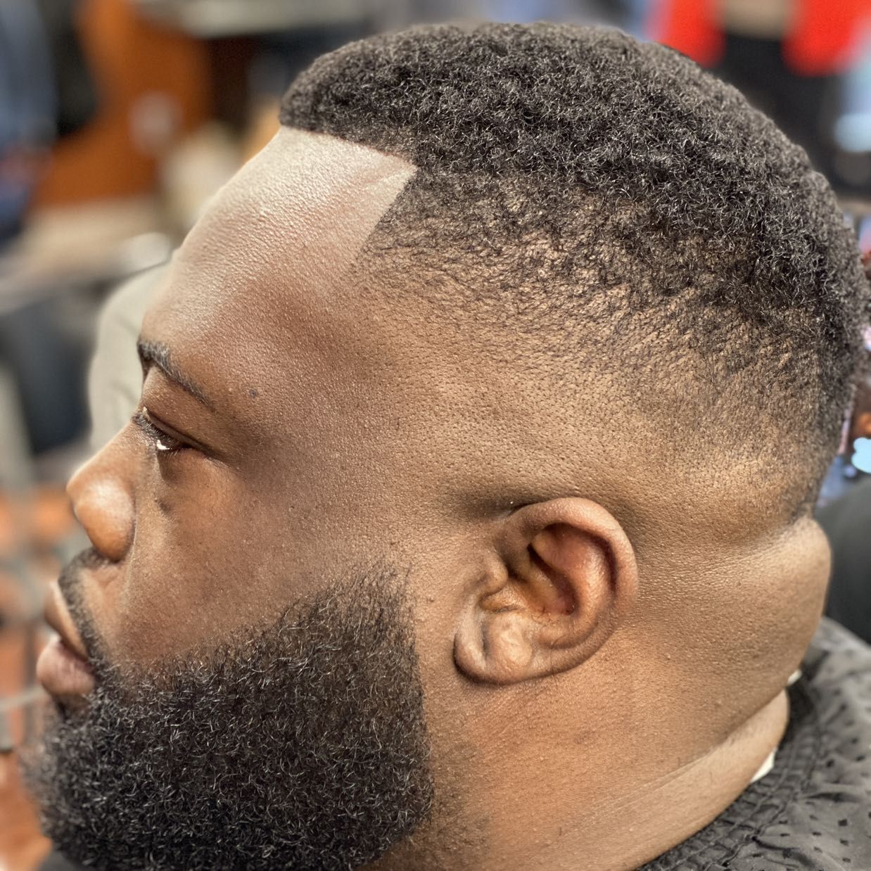Mid fade with full beard by Quan — Rocky's Primetime Barbershop Atlanta
