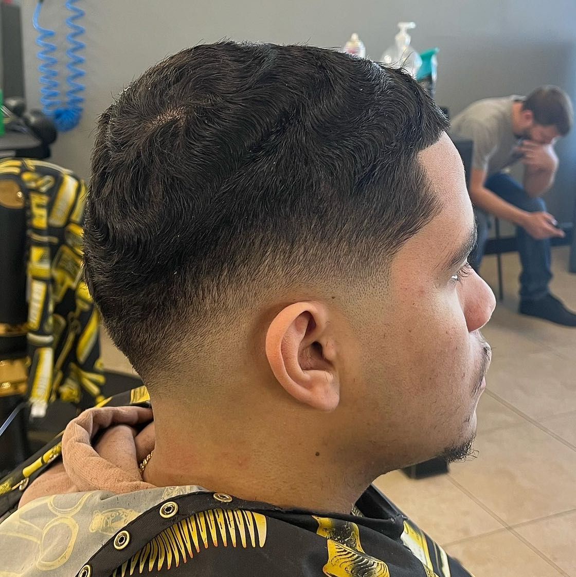 Low taper fade with textured top by Ro_cutz — Rocky's Primetime Barbershop Atlanta