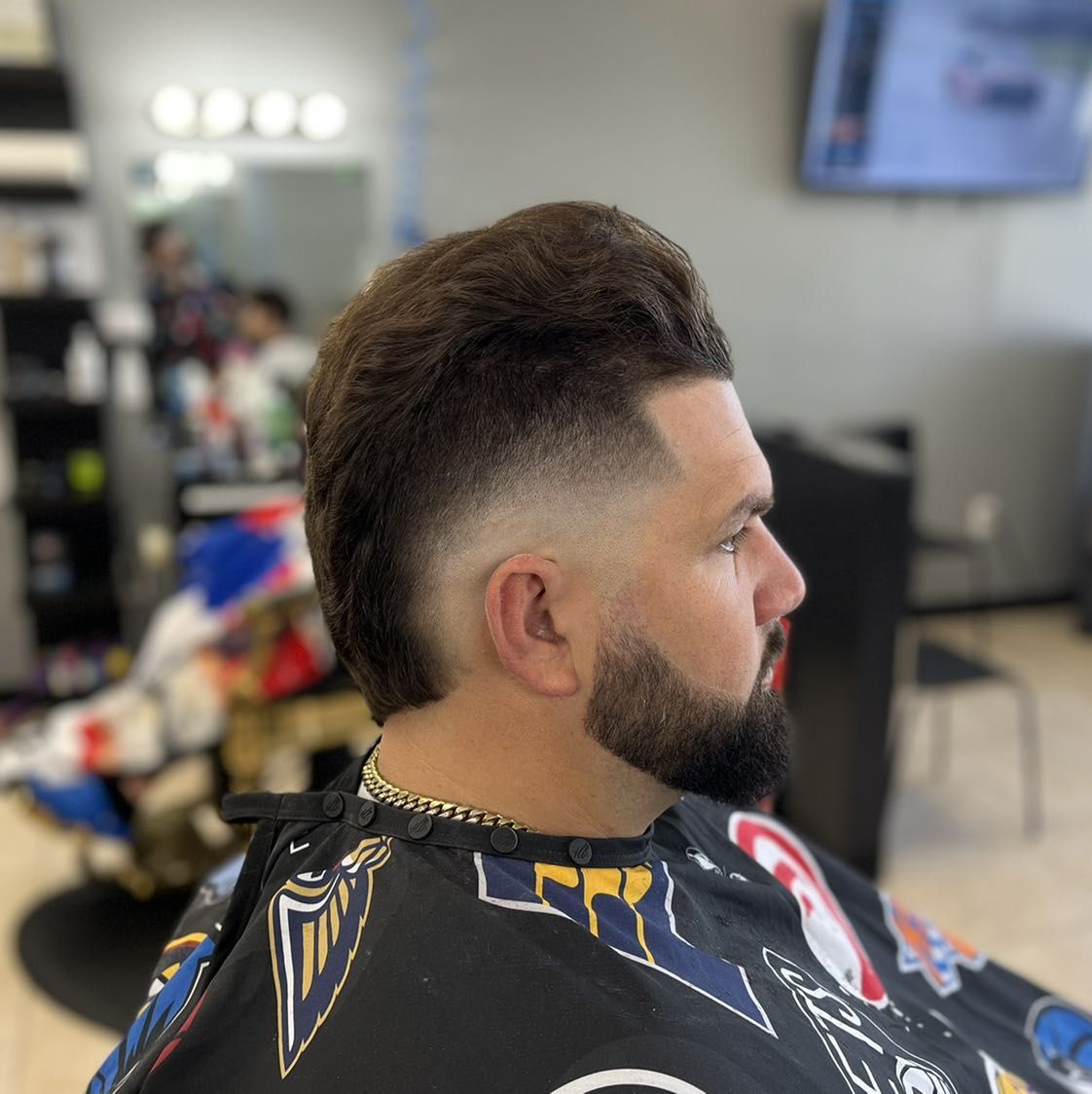 Brushed-up textured top with skin fade and beard by Ro_cutz — Rocky's Primetime Barbershop Atlanta