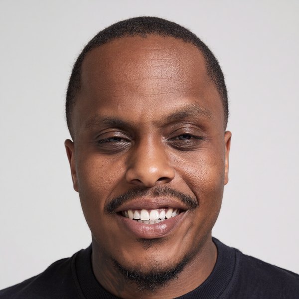 MJ — co-owner and master barber at Rocky's Primetime Barbershop, Buckhead Atlanta